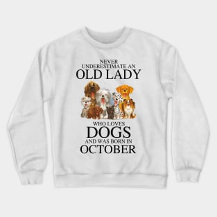 Never Underestimate An Old Lady Who Loves Dogs And Was Born In October Crewneck Sweatshirt